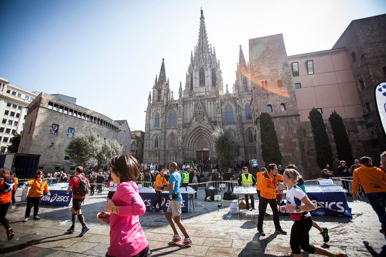 Support stands in front of a cathedral for a marathon in Barcelona.