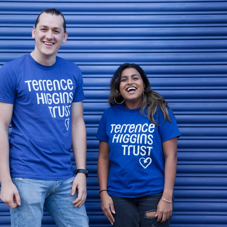 Two people in Terrence Higgins Trust t-shirts