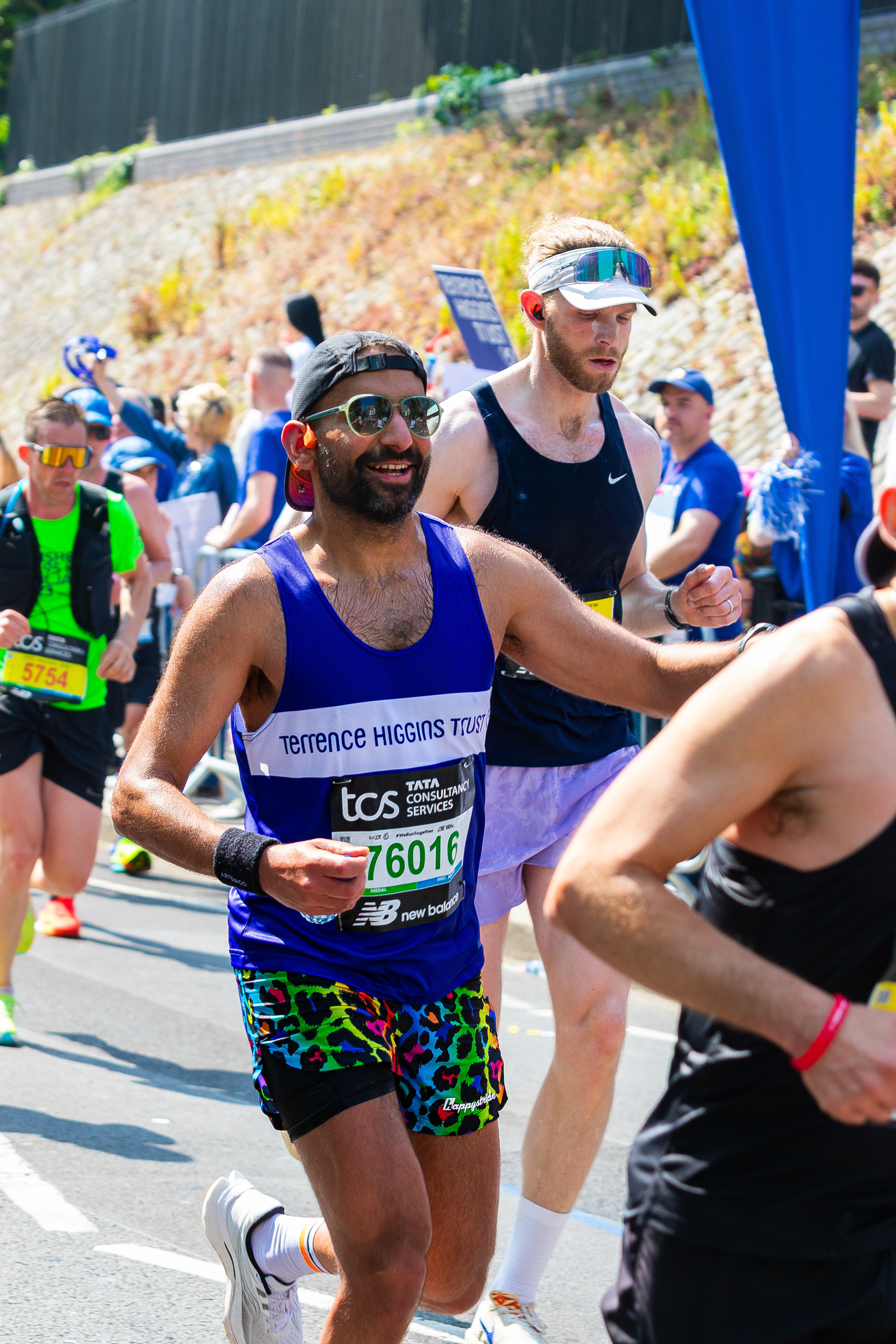A Terrence Higgins Trust runner with sunglasses during the London Marathon.