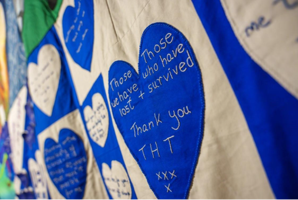 A panel of the Terry Higgins quilt showing blue and white hearts.