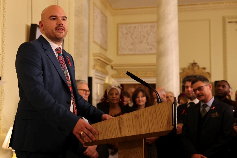 Richard Angell delivers a speech at 10 Downing Street for 2024 World AIDS Day.