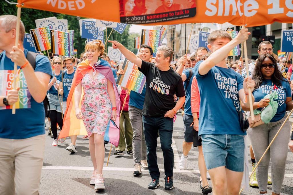 Angela Rayner and Sir Keir Starmer walking with Terrence Higgins Trust at Pride in London.