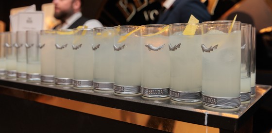 A line of beverages with ice cubes in glasses at the Terrence Higgins Trust auction.