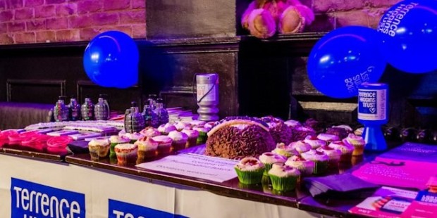 Fundraising stall with baked goods and are those grenades?