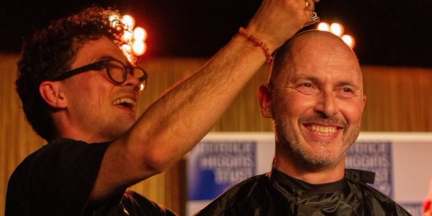 A Terrence Higgins Trust supporter have their head shaved on stage at the Royal Vauxhall Tavern.