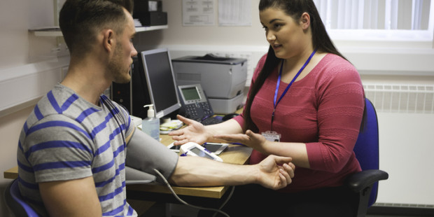 Healthcare professional with patient