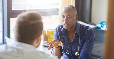 Doctor talking to patient