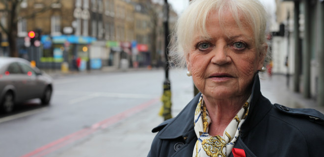 Lady wearing red ribbon