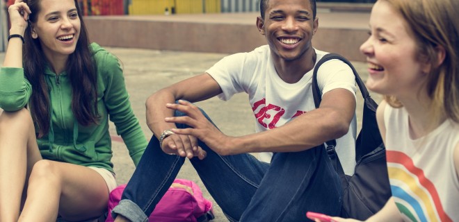 A group of smiling young people.