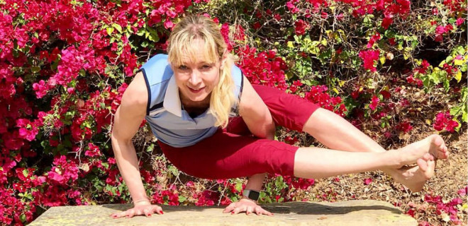 Volunteer Sabrina Jacobs doing yoga