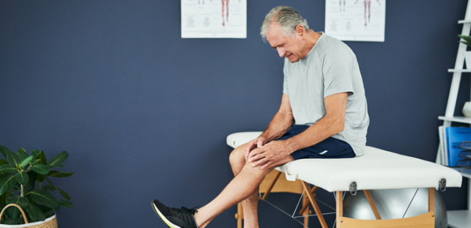 Man with knee raised