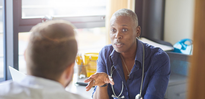 Doctor talking to patient