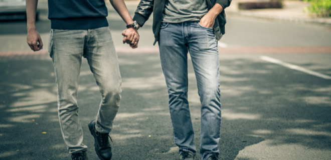 Two people holding hands