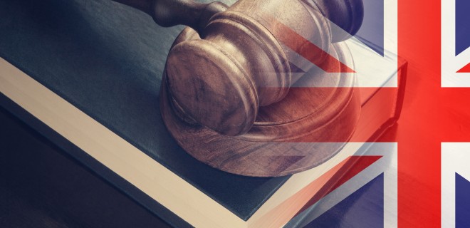 A gavel with a Union Jack overlay