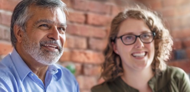 Two people talking with a professional