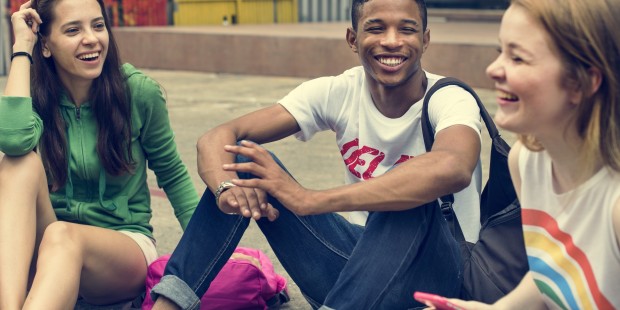 A group of smiling young people.