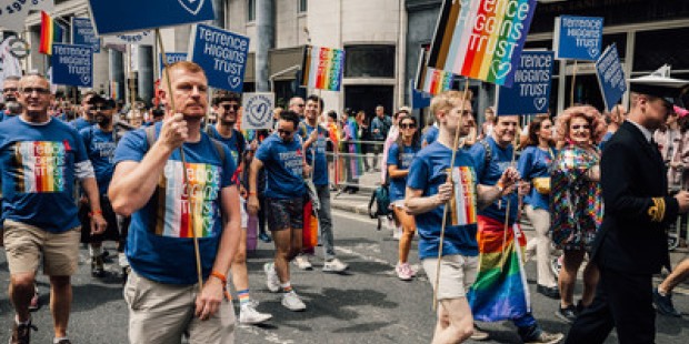 Terrence Higgins Trust marching at Pride 2023.