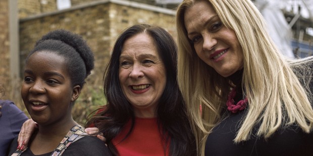 Three women smiling