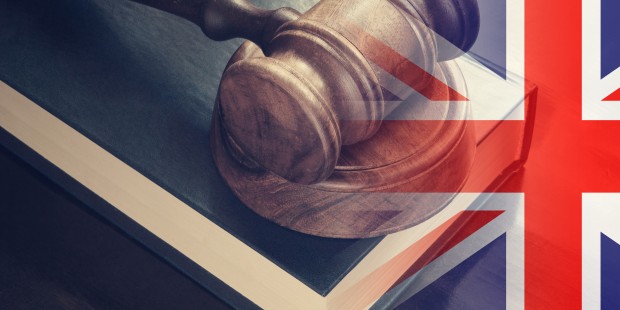 A gavel with a Union Jack overlay