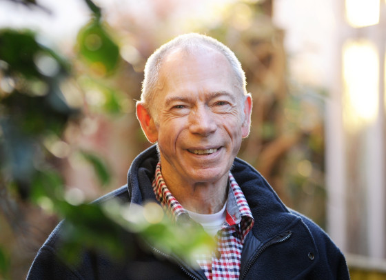Portrait of Maurice smiling in garden